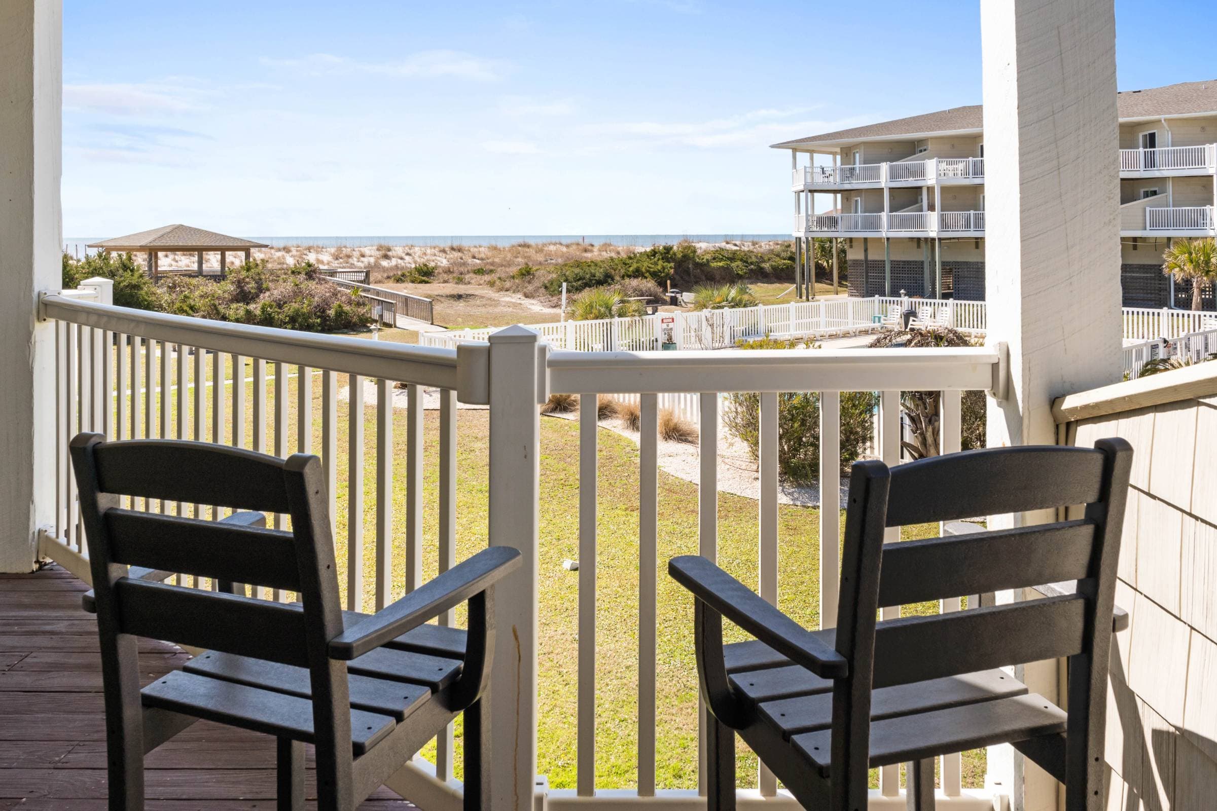 Large patio with chairs for easy beach gazing. 